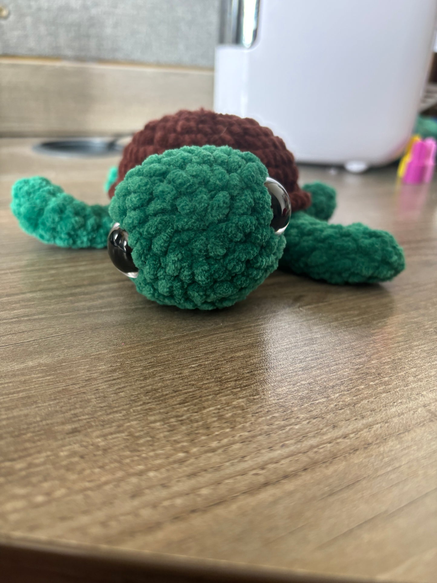 Emerald and brown crochet turtle