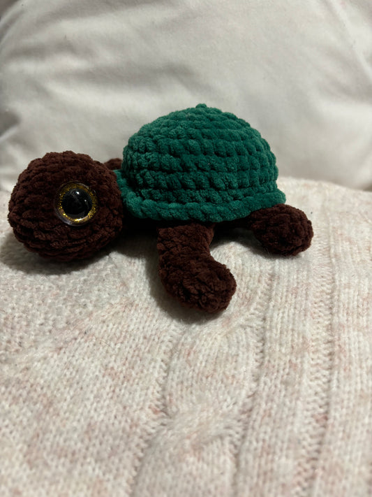 Green and brown crochet turtle