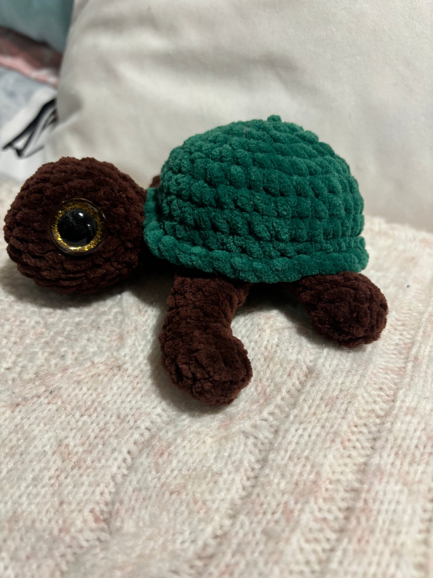 Green and brown crochet turtle